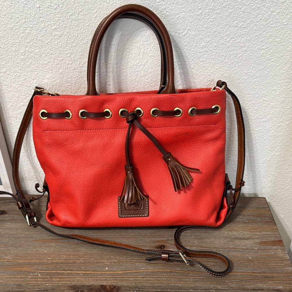 Dooney & Bourke Wakefield Orange leather tassel tote gold tone grommets
